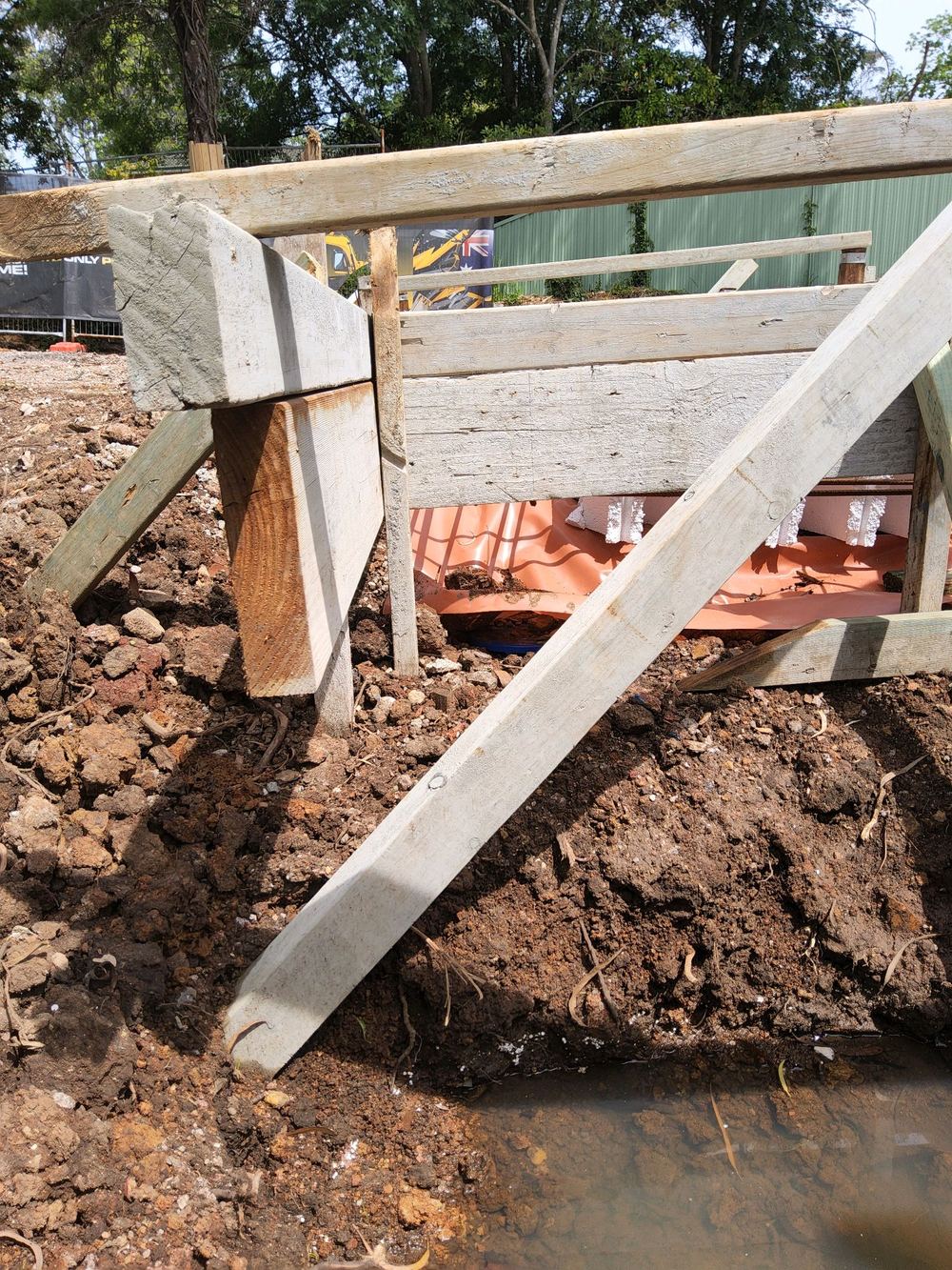 Clay fill subsiding away from the slab edges before the pour, found during a slab pre-pour inspection in Pennant Hills