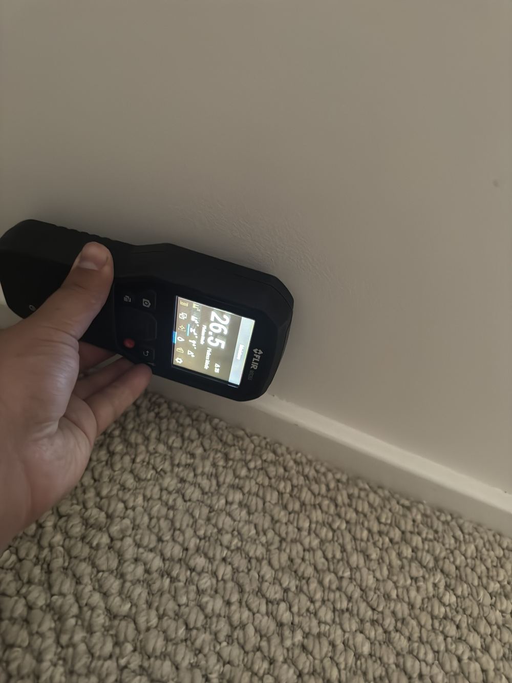 High moisture reading at the base of the wall behind a shower screen, found during a pre-purchase building and pest inspection in Castle Hill